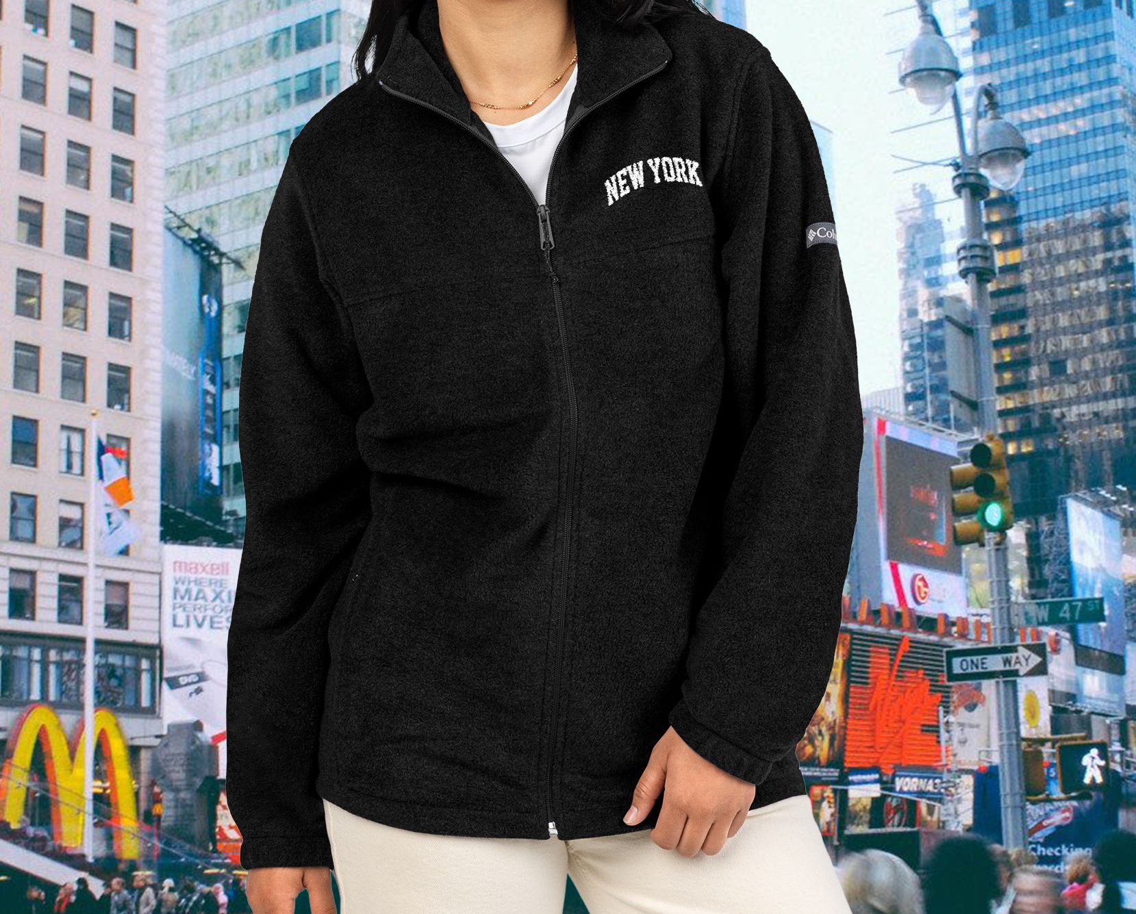 Woman wearing  a unisex embroidered new york columbia fleece jacket